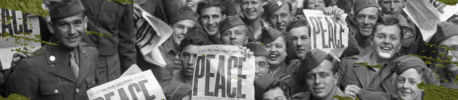 soldiers holding up signs that say "peace"