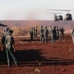 Huey helicopters carrying UN personnel during prisoner exchange in Vietnam