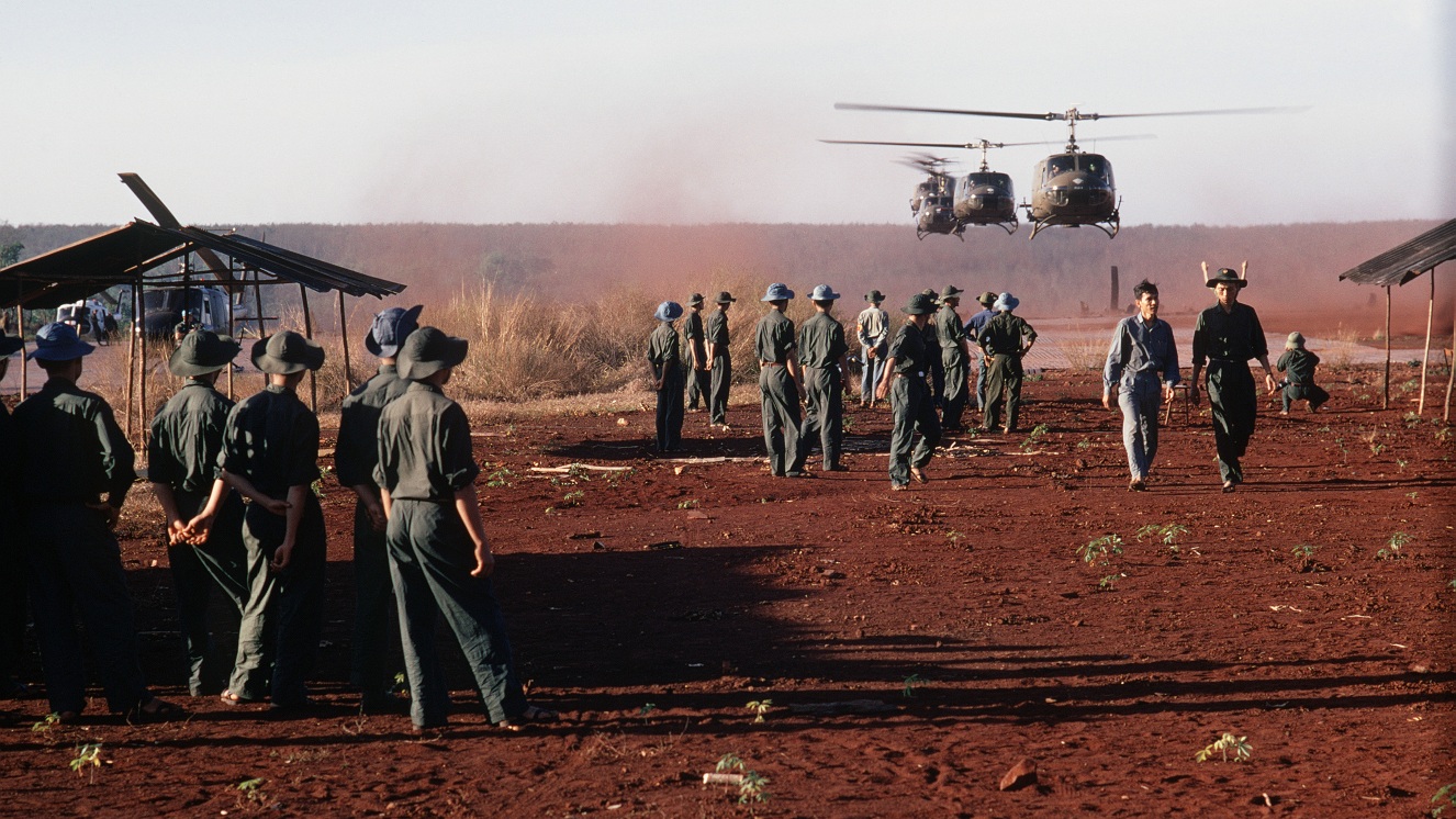 Huey helicopters carrying UN personnel during prisoner exchange in Vietnam