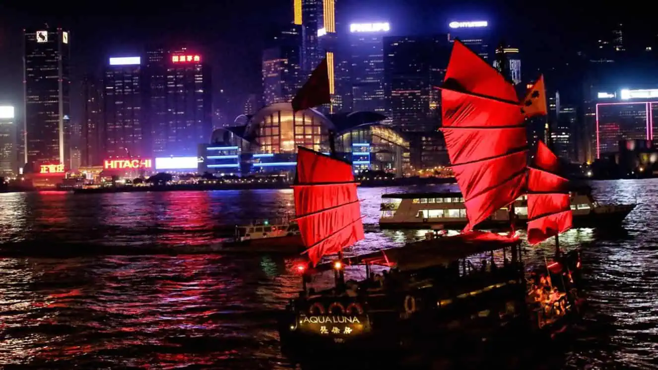 A photo of a Chinese junk boat in a dock.