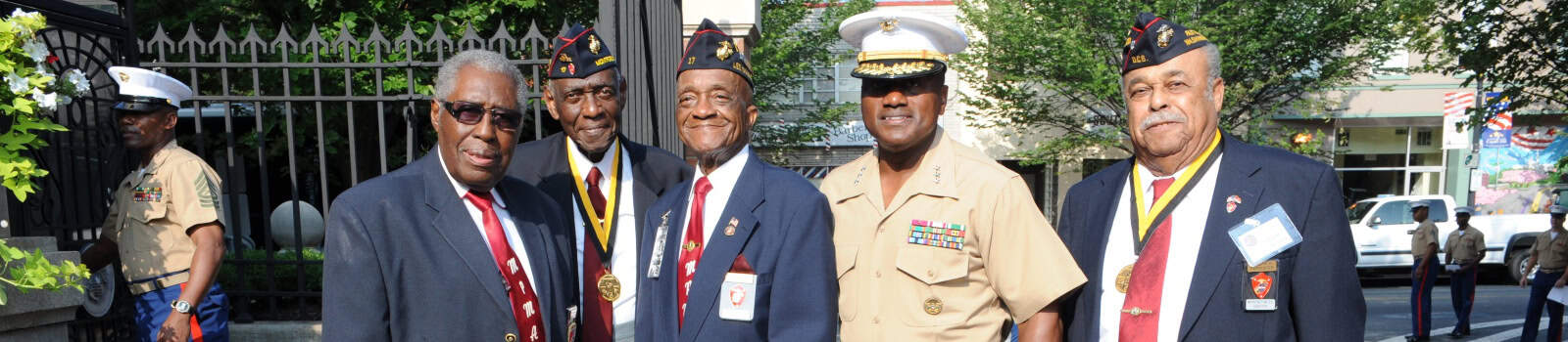 U.S. Marine Lt. Gen. Willie J. Williams, center right, the director of Marine Corps Staff, poses for a photo with former Montford Point Marines prior to the breakfast held in their honor in Crawford Hall at Marine Barracks Washington, Washington D.C., Aug. 26, 2011.