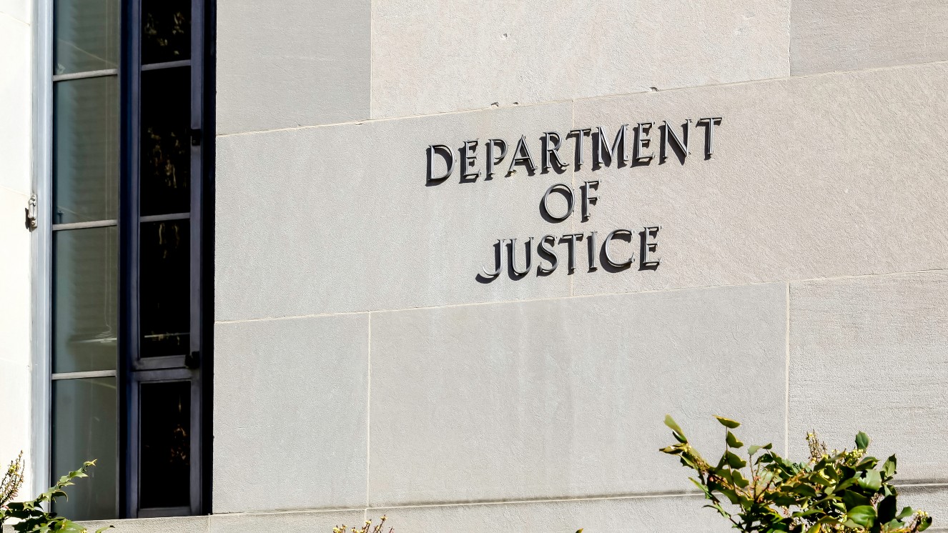 The sign at the Department of Justice in Washington D.C., where charges against Ethan Melzer were brought for his role in attempting to harm his own unit.