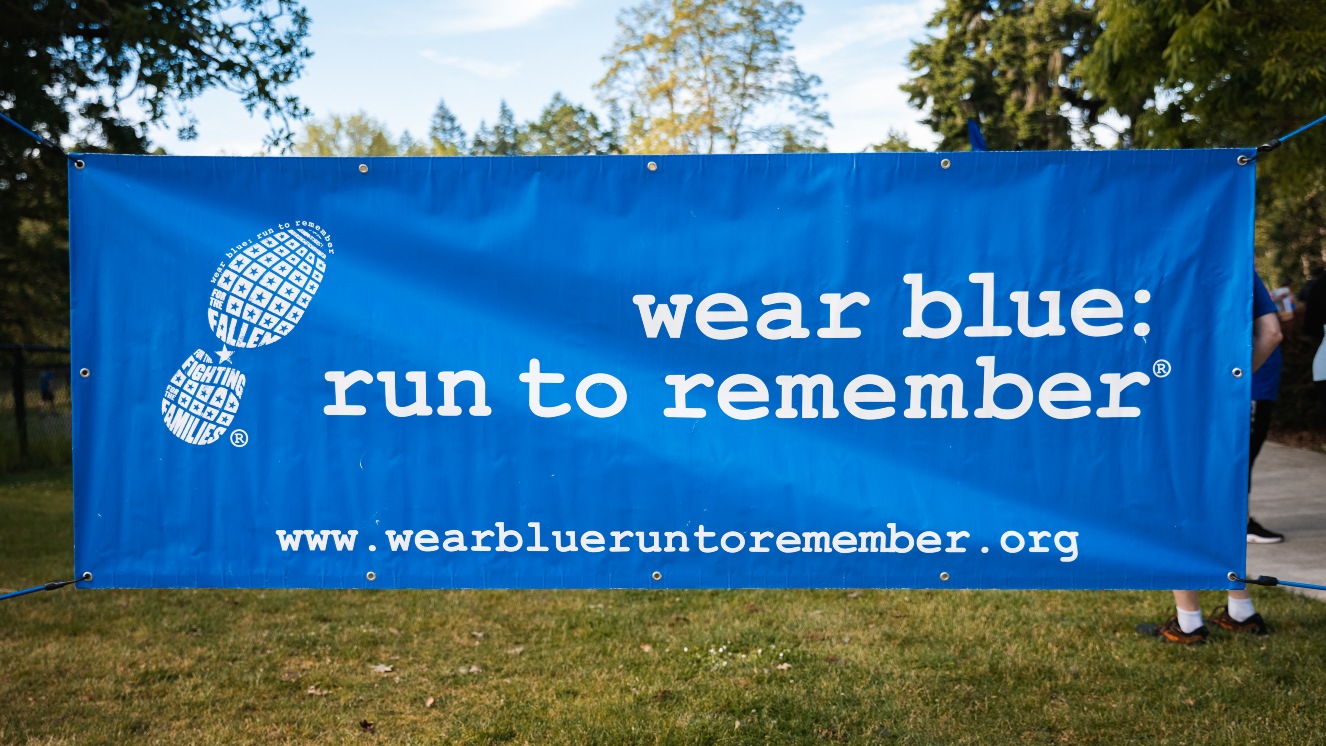 A sign at the Dupont, Washington wear blue run to remember event, a communal run that commemorates fallen service members.