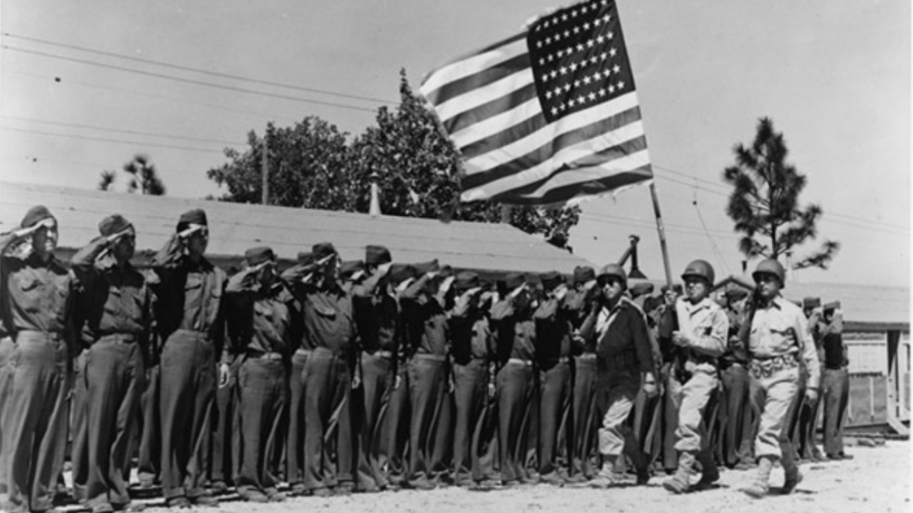 The U.S. Army 442nd Regimental Combat Team, the most decorated unit in WW2, stands in formation at Camp Shelby, Mississippi, June 1943.