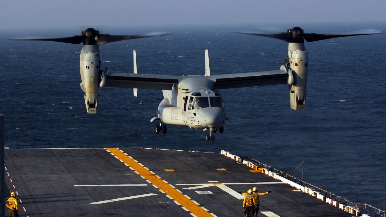 A V-22 Osprey aircraft from VMM 263 Thunder Chickens conducts landing qualifications aboard the multi-purpose amphibious assault ship USS Bataan (LHD 5).