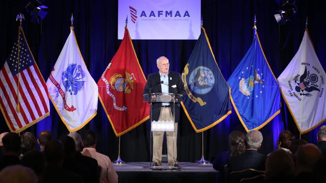 AAFMAA President Mike Meese speaking about the survivor benefit plan and other veteran benefits at the organization's 140th anniversary.