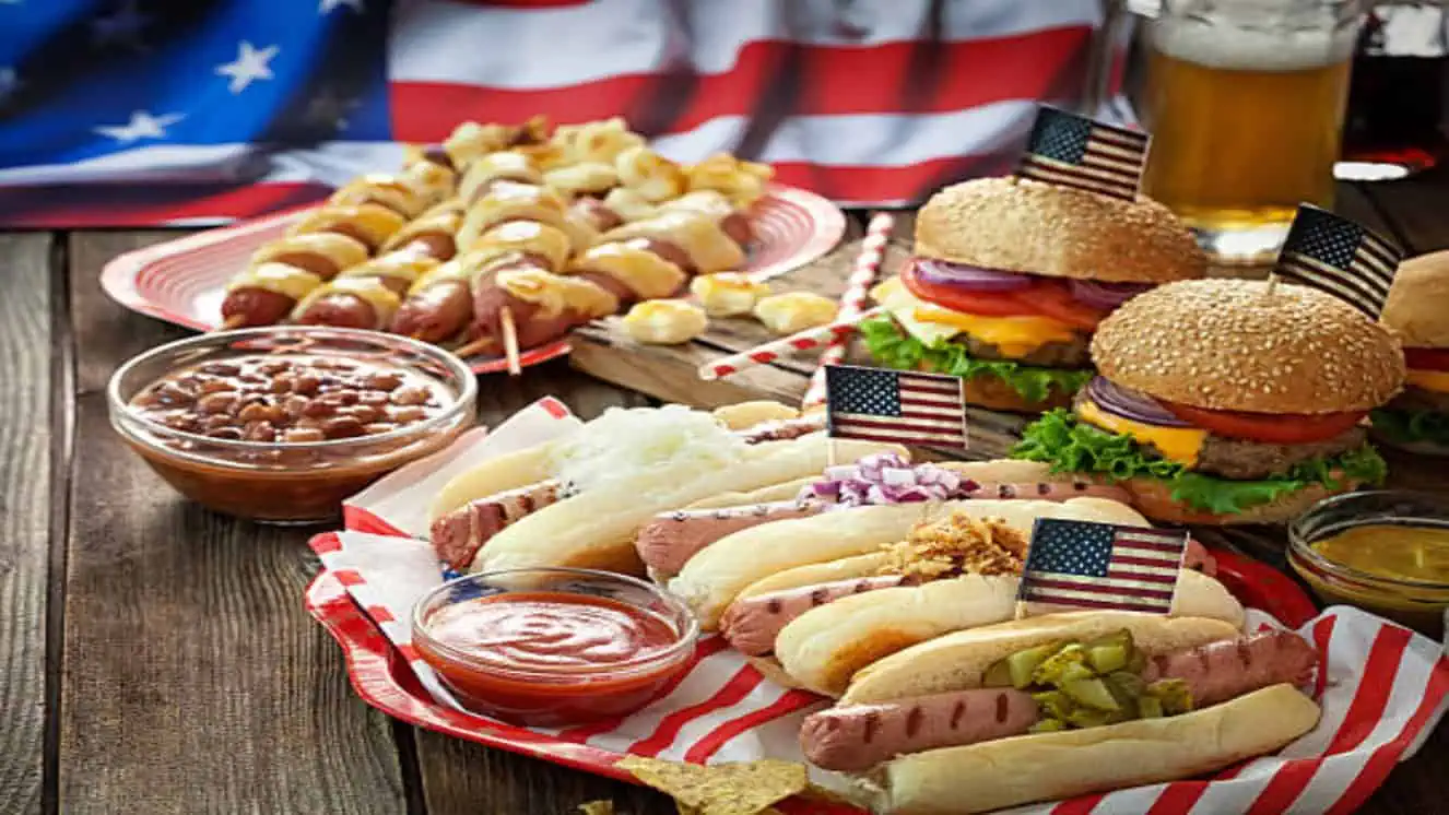 A collection of 4th of July food on a table, ready for a holiday party to enjoy.