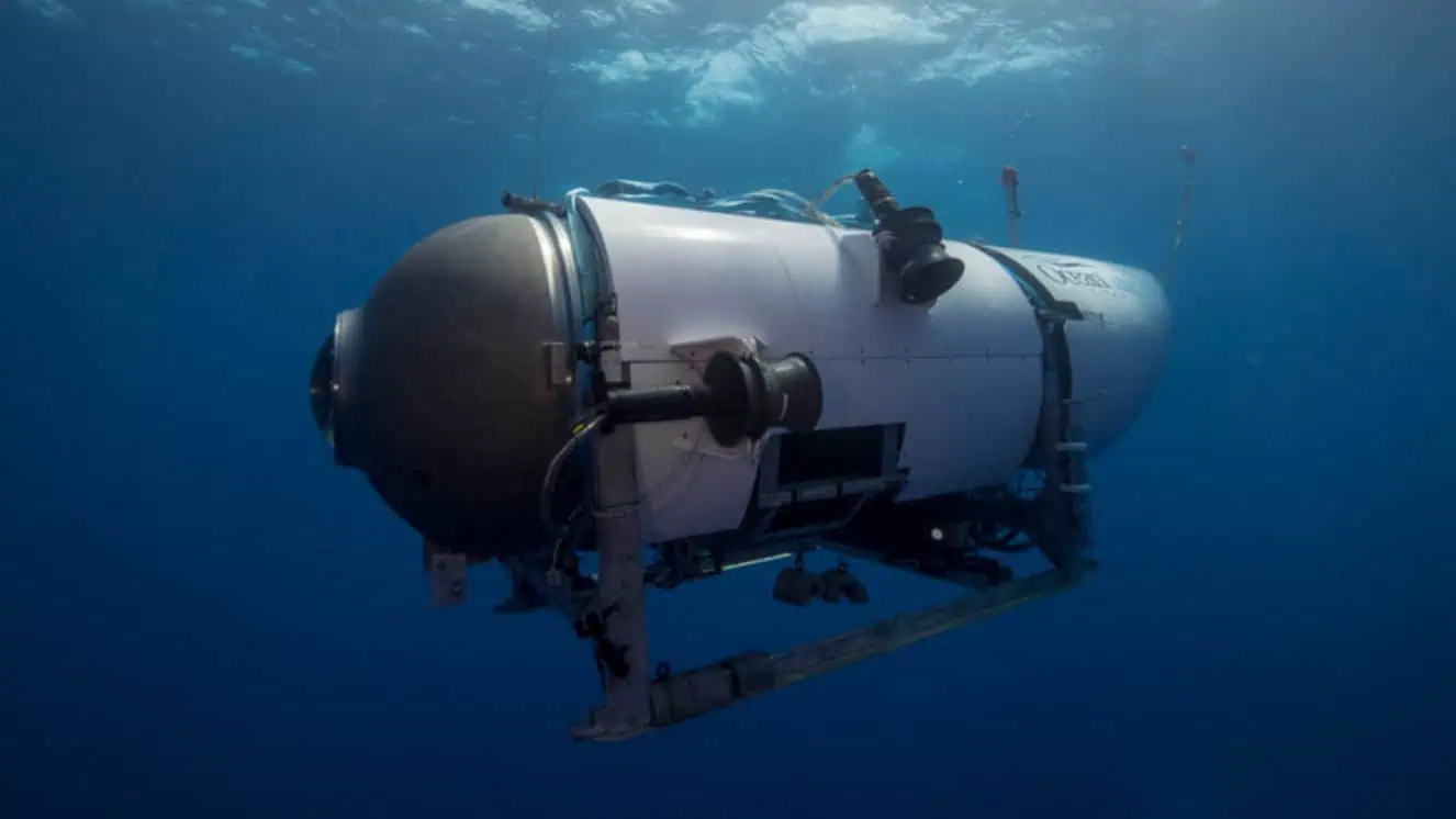 Oceangate submersible Titan seen diving beneath the water.