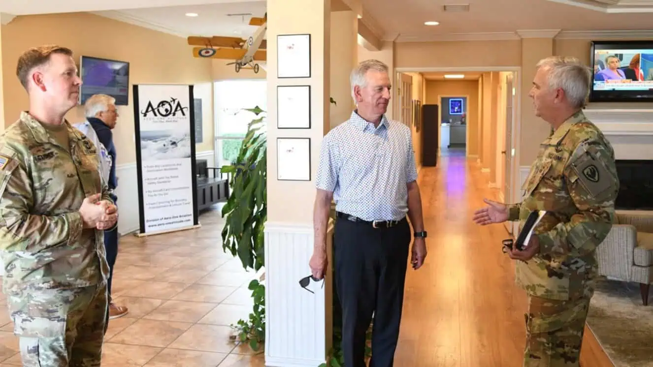 Col. Whitney Gardner, U.S. Army Aviation Center of Excellence chief of staff, and Paul Meissner, USAACE air traffic and airspace officer, greet Senator Tommy Tuberville in Dothan, Alabama.