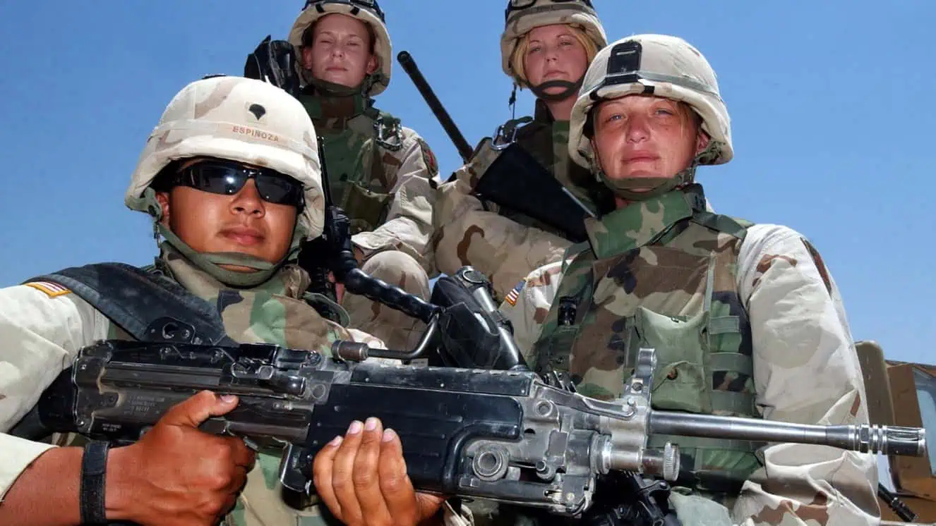 7/24/04 - AR RAMADI JUNCTION CITY IRAQ -(front row L-R) Specialist Cynthia Espinoza of Bronx New York, and Staff Sergeant Raine Ruthie, (second row L-R)Specialist Shannon Morgan of Mina Arkansas and Specialist Michele Perry of Hampton Virginia are all members of Team Lioness a group of women who participate in joint military operations and raids with US Marines. photo LLOYD FRANCIS/ARMY TIMES