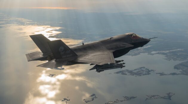 The f-35, the next generation combat aircraft, flying above the clouds.
