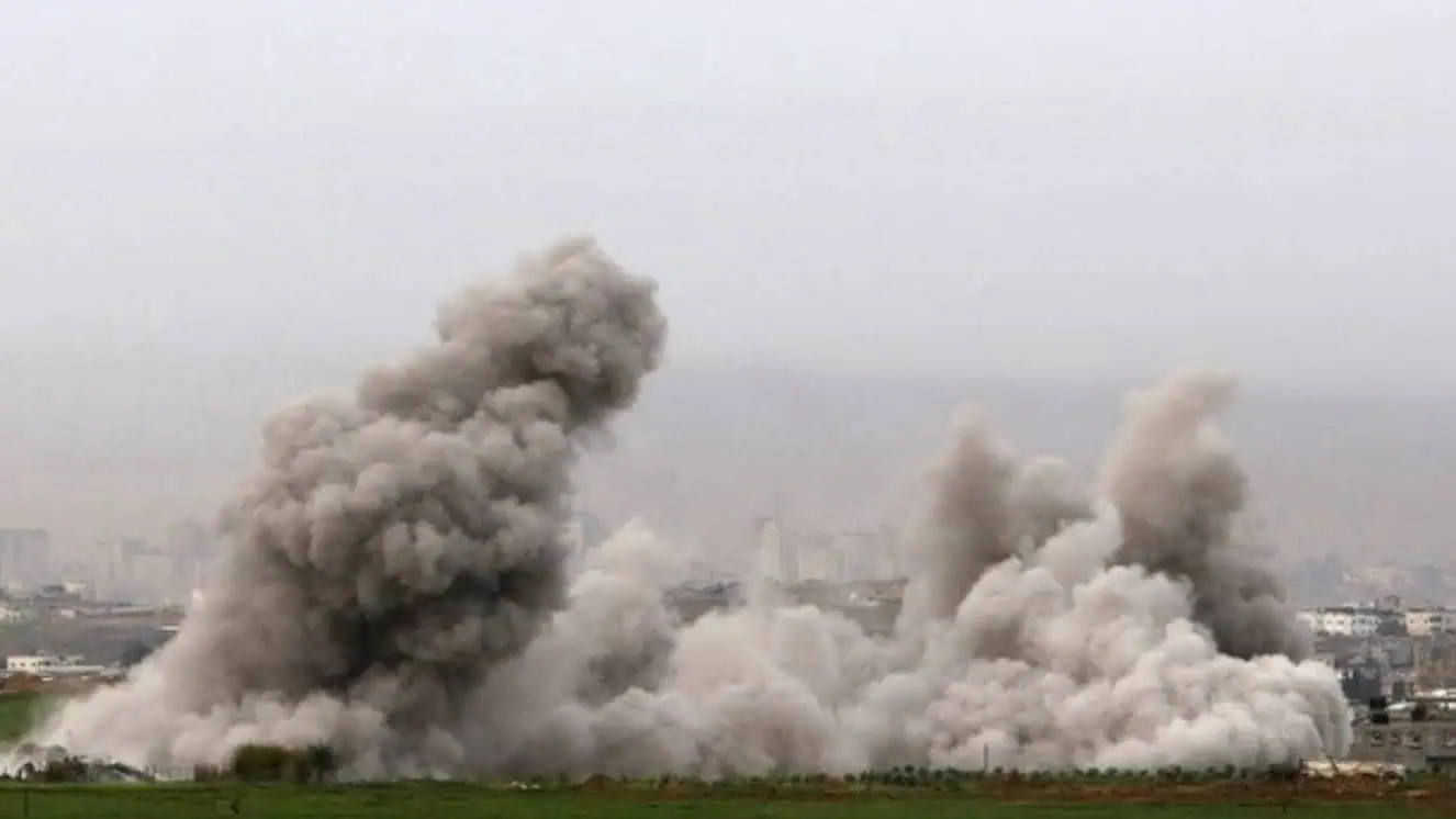 Smoke billows from the Gaza Strip following an Israeli air strike during the Israel Gaza conflict.