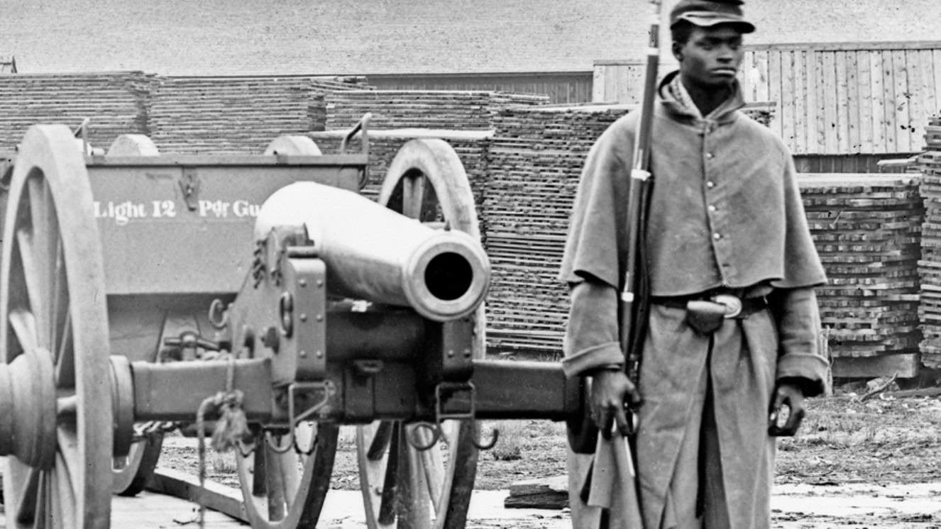 An Soldier in the United States Colored Troops sentry, city 1865.