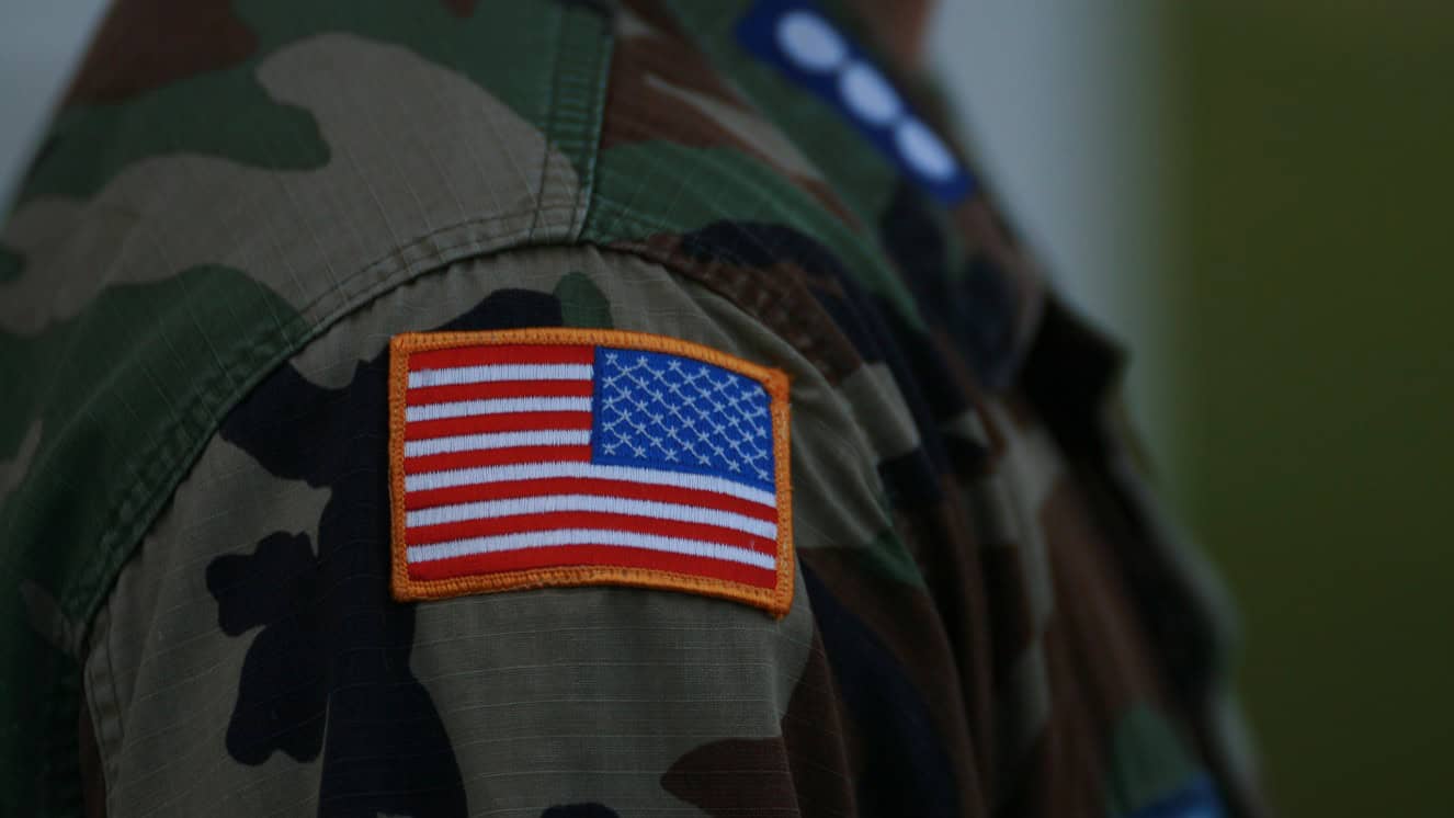 US troops are deployed to the middle east in this picture showing a uniform with an American flag.