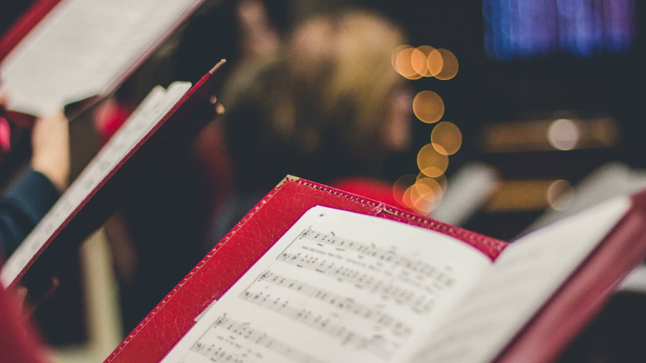 A notebook of christmas music answering what is the most popular christmas song.