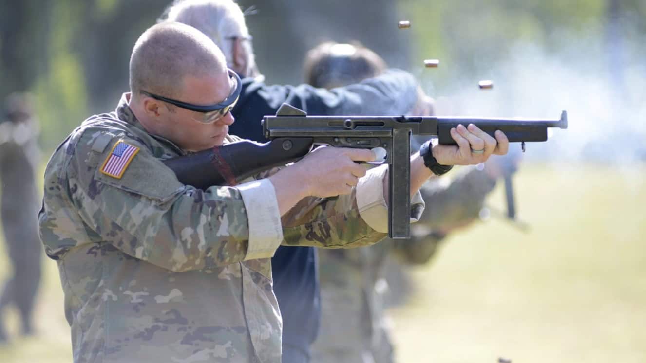 A student assigned to the U. S. Army John F. Kennedy Special Warfare Center and School who is in the Special Forces Weapons Sergeant Course fires a Tommy gun during weapons training at Fort Bragg, North Carolina