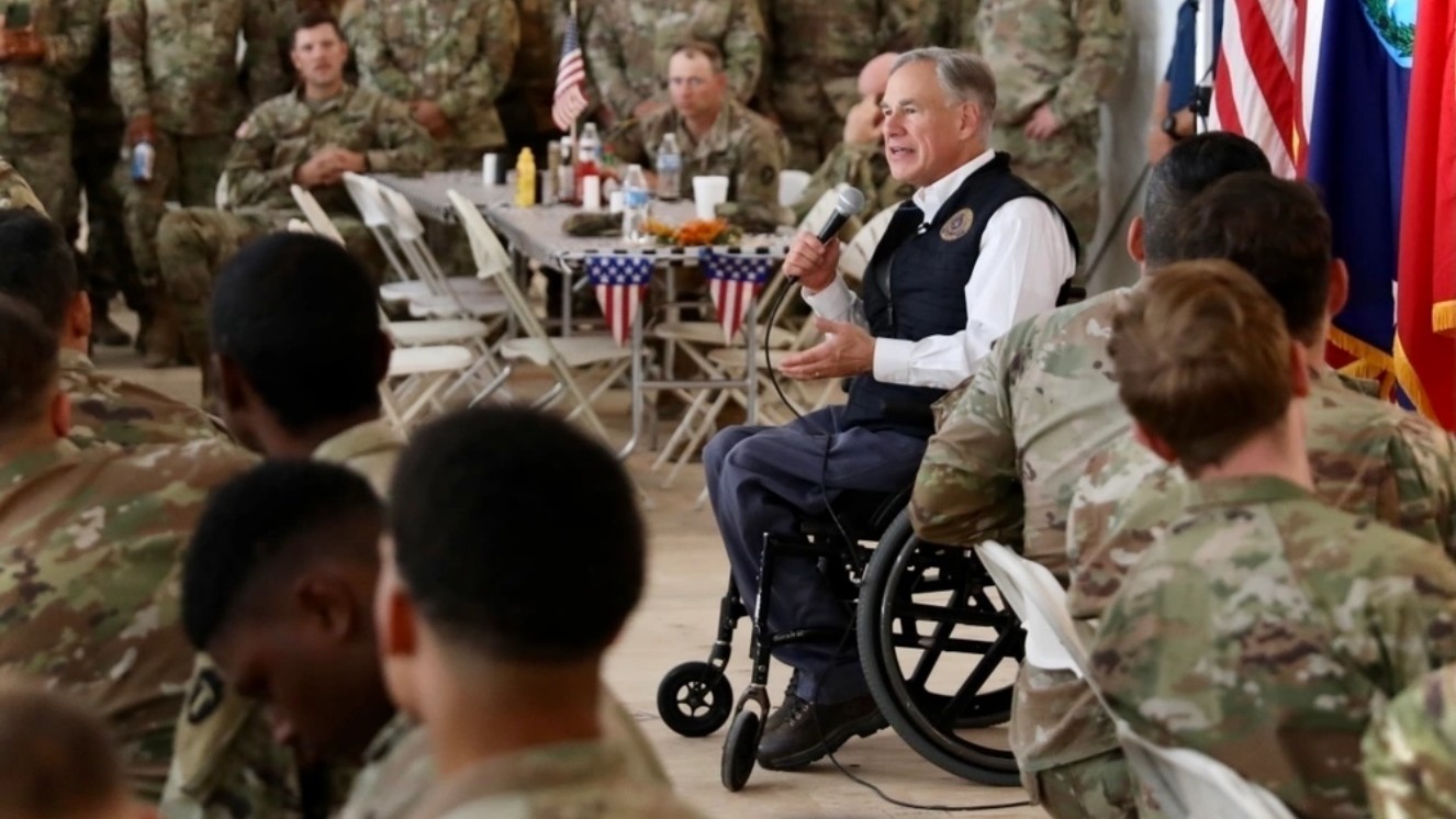 Texas Gov. Greg Abbott visits with members of the Texas Military Department and the Texas Department of Public Safety talking about Eagles Pass.