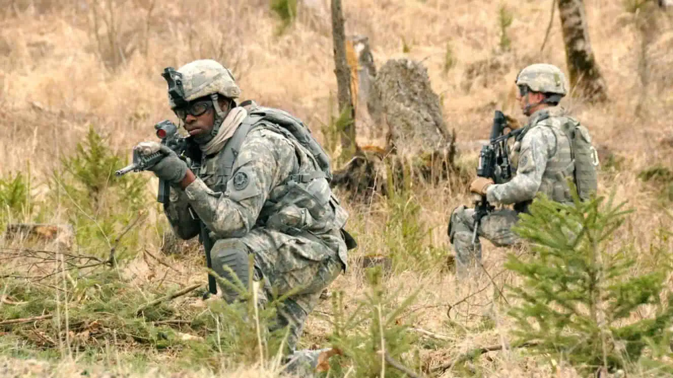 U.S. Army soldiers from 2nd Squadron, 2nd Cavalry Regiment, are on alert during Platoon Live Fire Exercise on Grafenwoehr Training Area, showing Army structure.