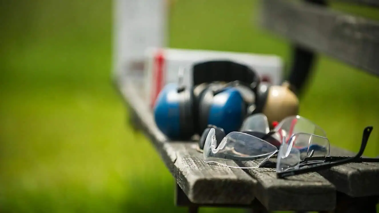 Shooting gear on a bench.