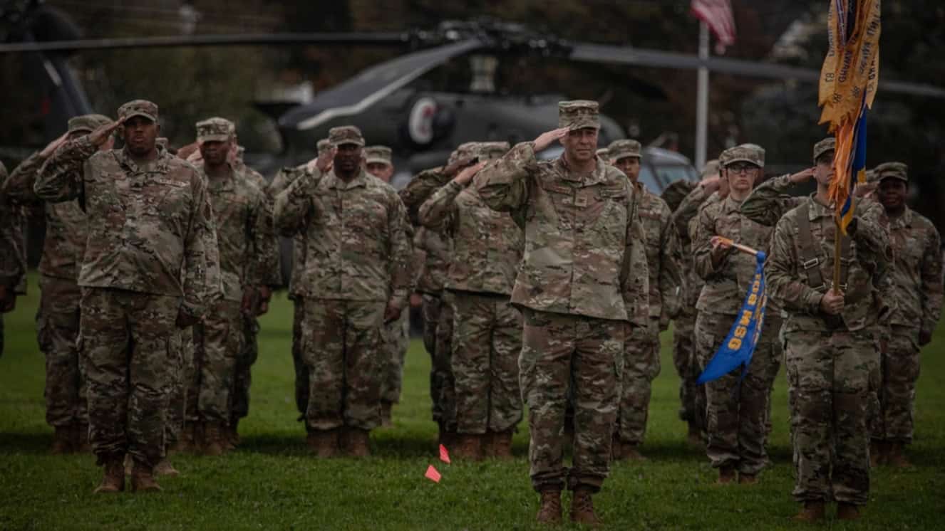 Soldiers showing military discipline saluting.