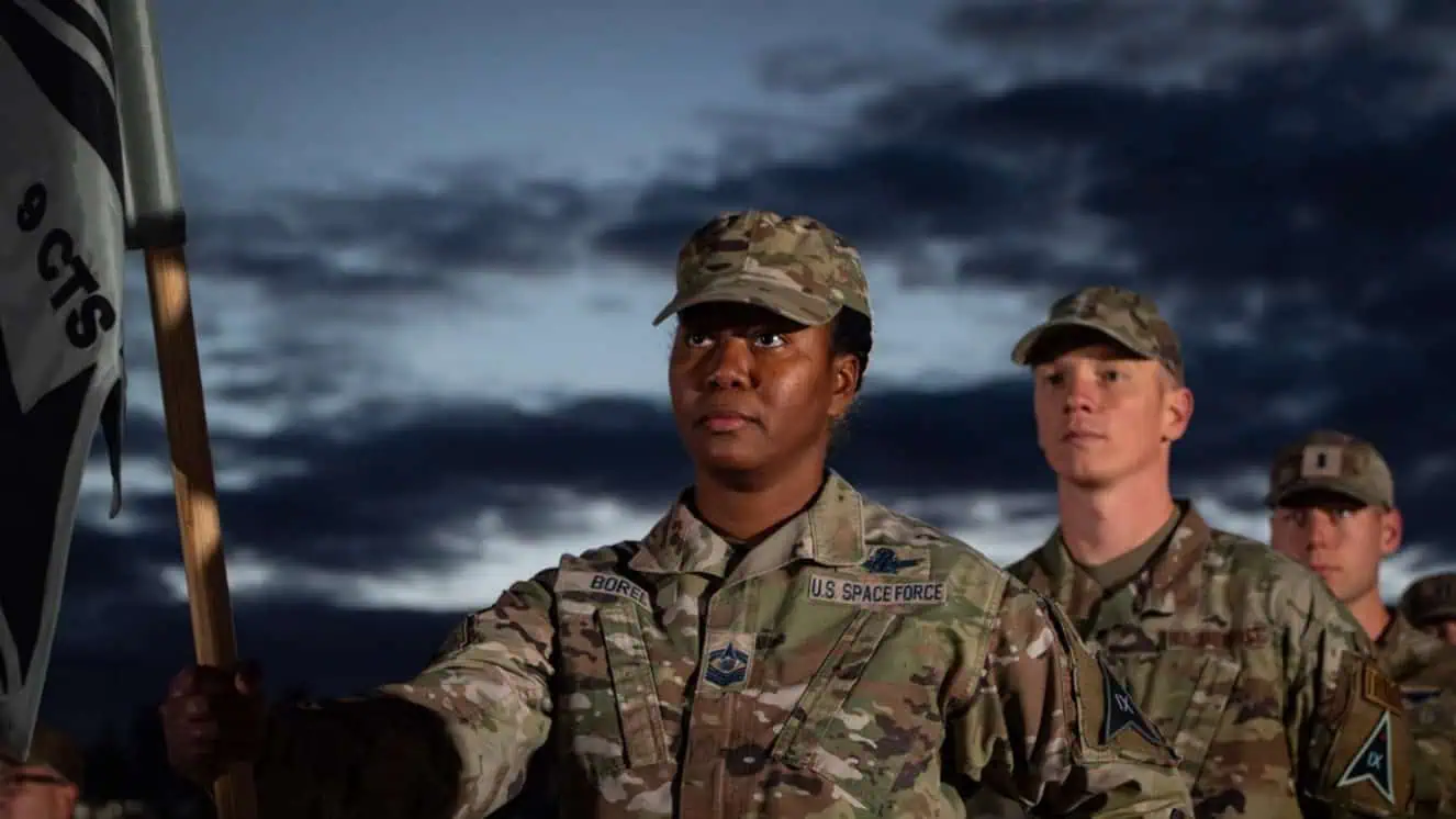 9th Combat Training Squadron Senior Enlisted Leader, U.S. Space Force SMSgt Twana Borel and members of Space Delta 9, participate in a retreat ceremony at Schriever SFB , CO in light of the space force budget.