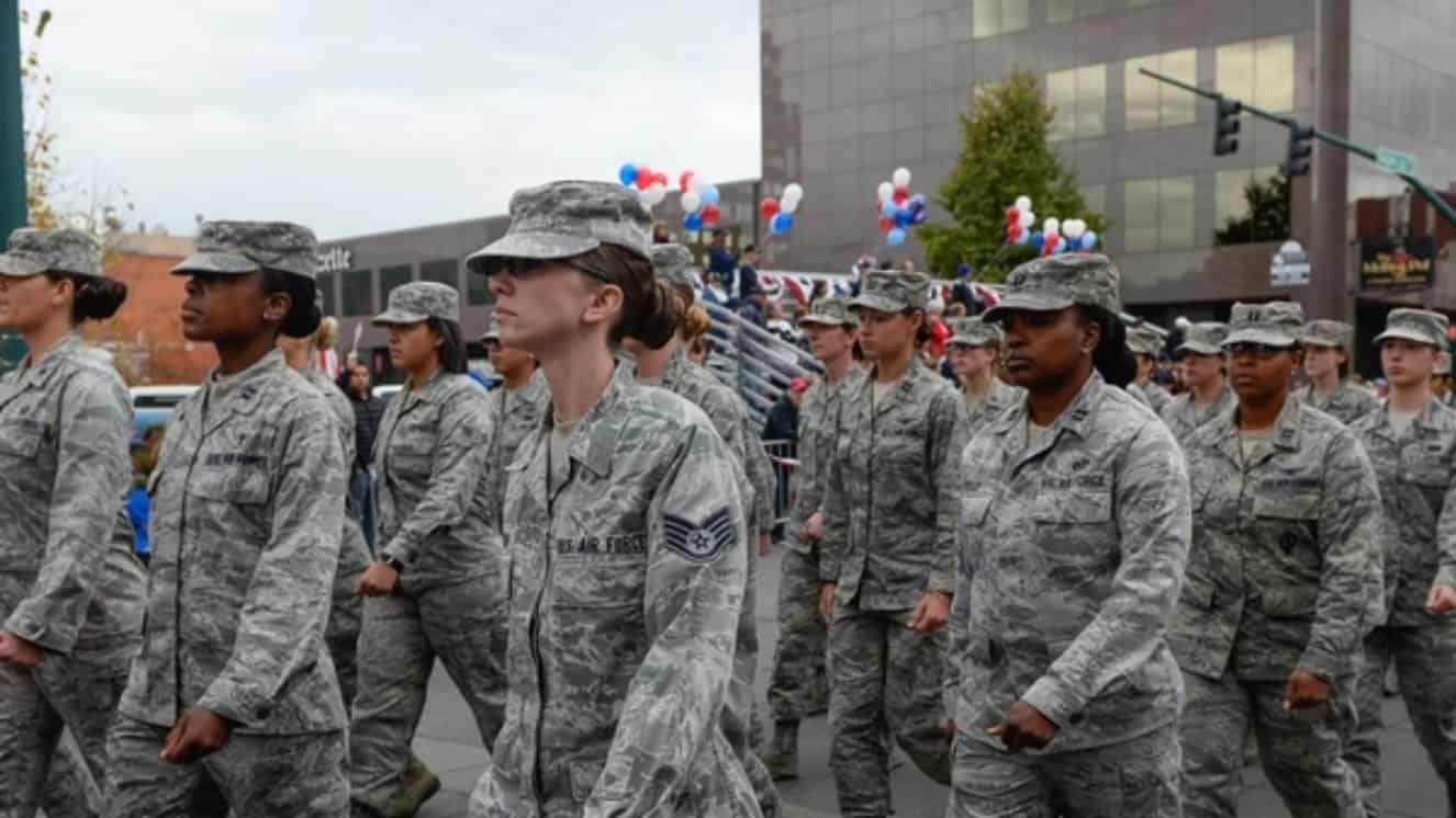 Women Veterans marching.