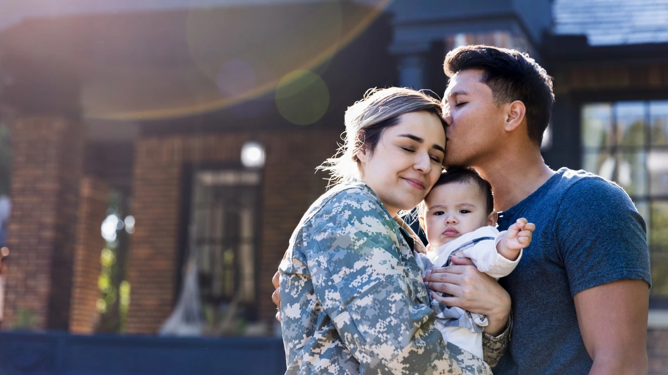 Family standing outside a clinic after talking about fertility benefits.