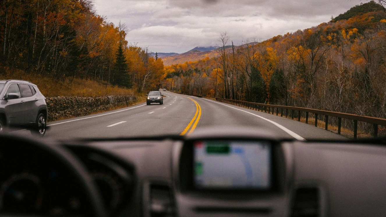 Taking a Montana road trip in a car.