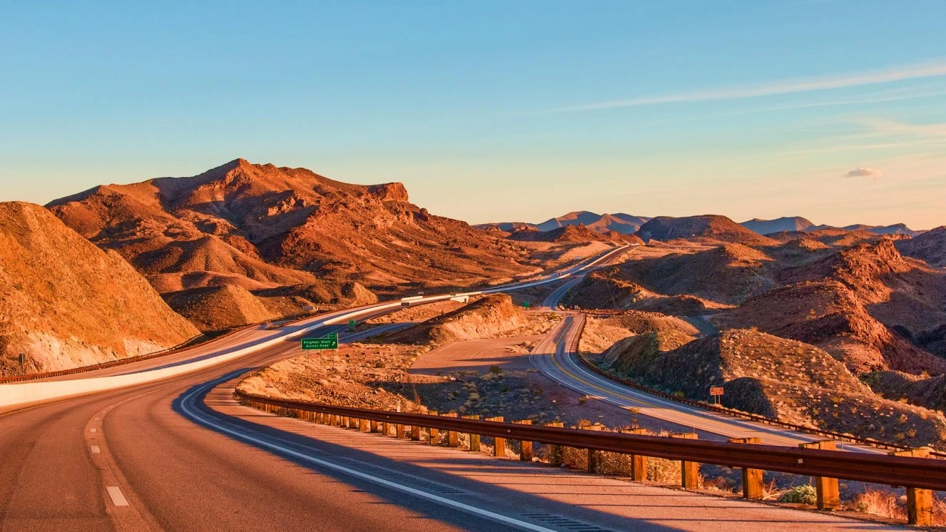 Driving on the highway to find the best road trips in the US.