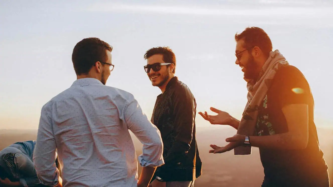 Group of men talking during mens mental health month.