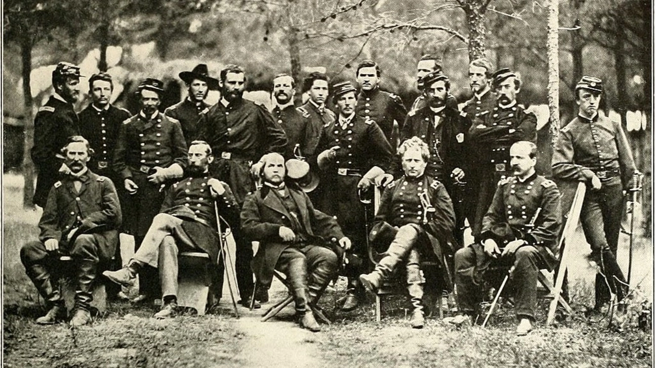 American Civil War Soldiers sitting for a picture.