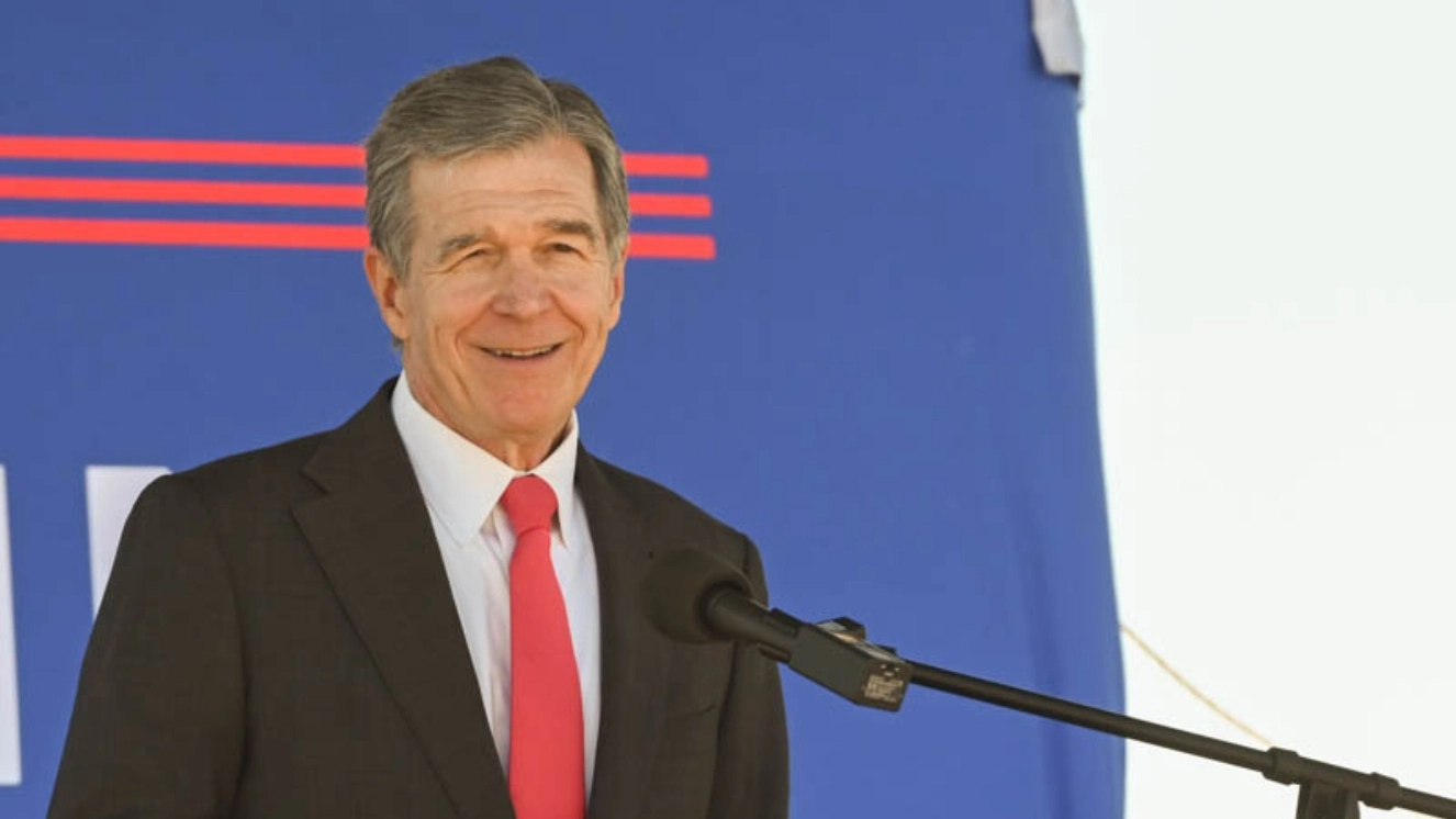 Roy Cooper speaking at a campaign rally for Biden and Harris.