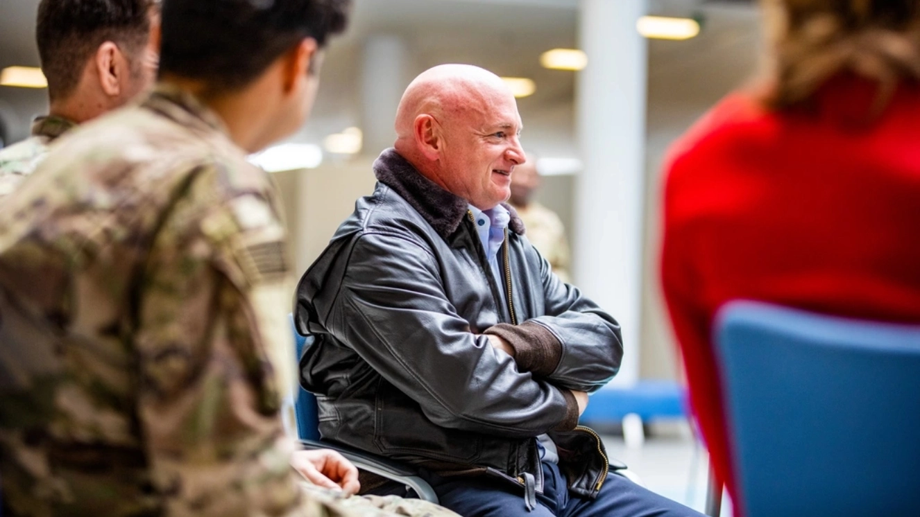 U.S. Senator Cory Booker and Senator Mark Kelly among other U.S. Representatives meet with U.S. Army Paratroopers assigned to the 82nd Airborne Division in Jasionka, Poland, on April 14, 2022.