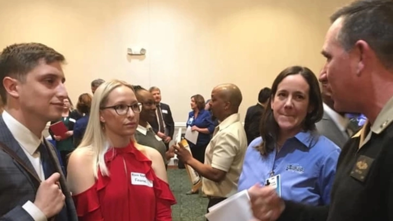 FREDERICKSBURG, Va. (Feb. 25, 2020) – Capt. Casey Plew, Naval Surface Warfare Center Dahlgren Division (NSWCDD) commanding officer, and Susan Tubman, NSWCDD Staffing and Classification Branch head discuss career opportunities with candidates at the fourth annual NSWCDD Career Fair. talking about veteran status jobs.