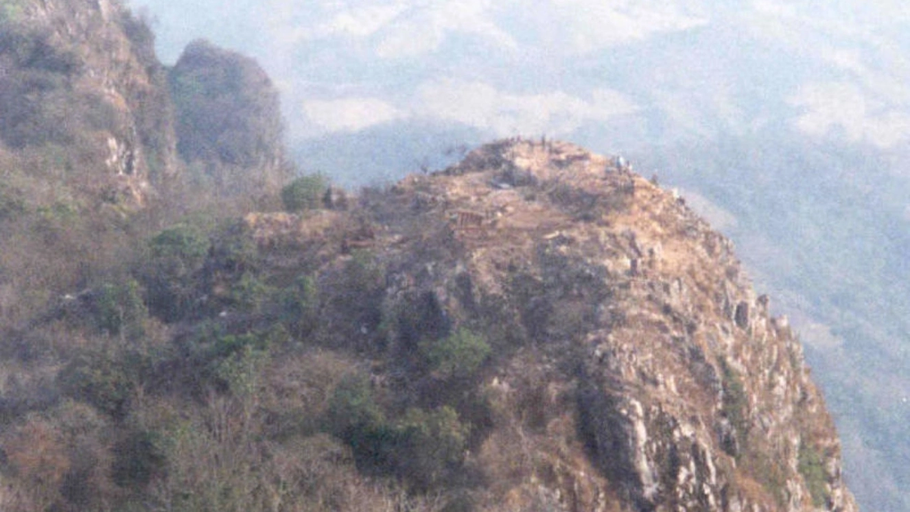 This photograph was taken by USAF Lieutenant Colonel Jeannie Schiff in 1994, as part of the Lima Site 85 Recovery Effort. This photograph shows an aerial of Phou Pha Thi.