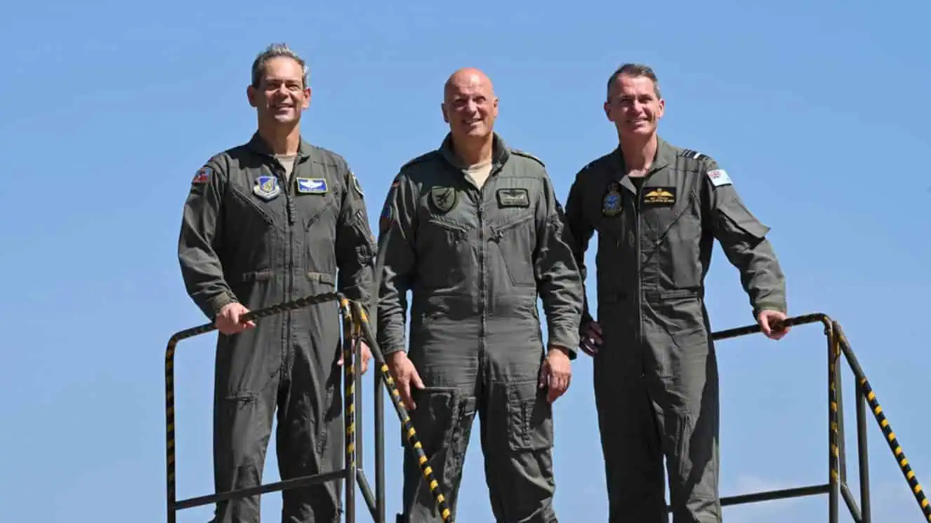 U.S. Air Force Gen. Ken Wilsbach, left, Pacific Air Forces commander, poses for a photo with German Air Force Lt. Gen. Ingo Gerhartz, middle, Chief of Air Force, and Royal Australian Air Force Air Marshal Robert Chipman, right, Chief of Air Force, at RAAF Base Darwin, Australia, Sept. 5, 2022.