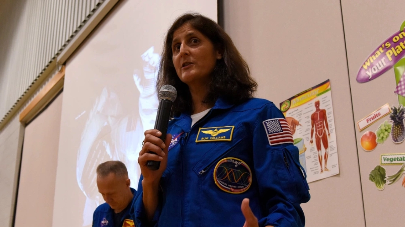 Sunita Williams whose stuck in space talking to a group of people.