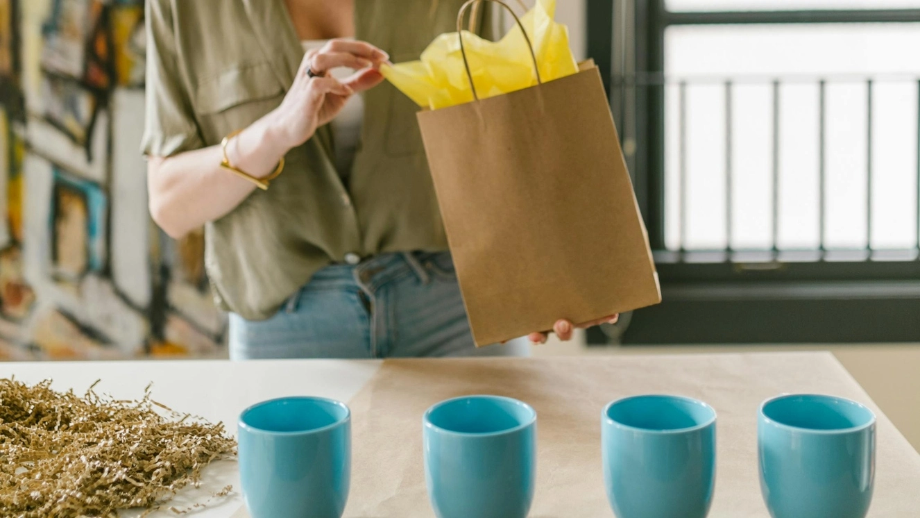 Woman holding a bag with small business ideas.